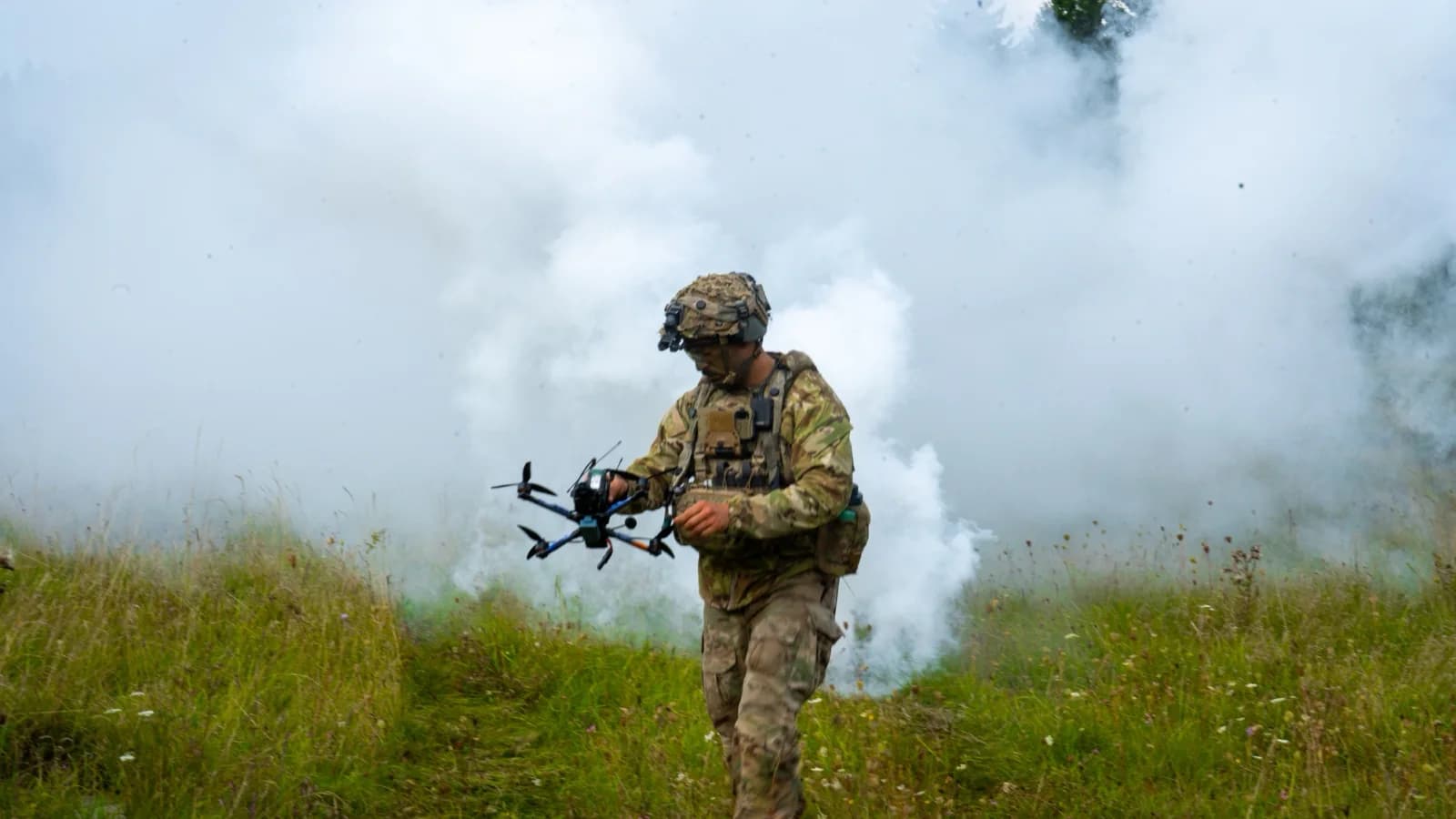 U.S. Army soldier carrying a small drone during Saber Junction 25 in Germany, September 2025.
