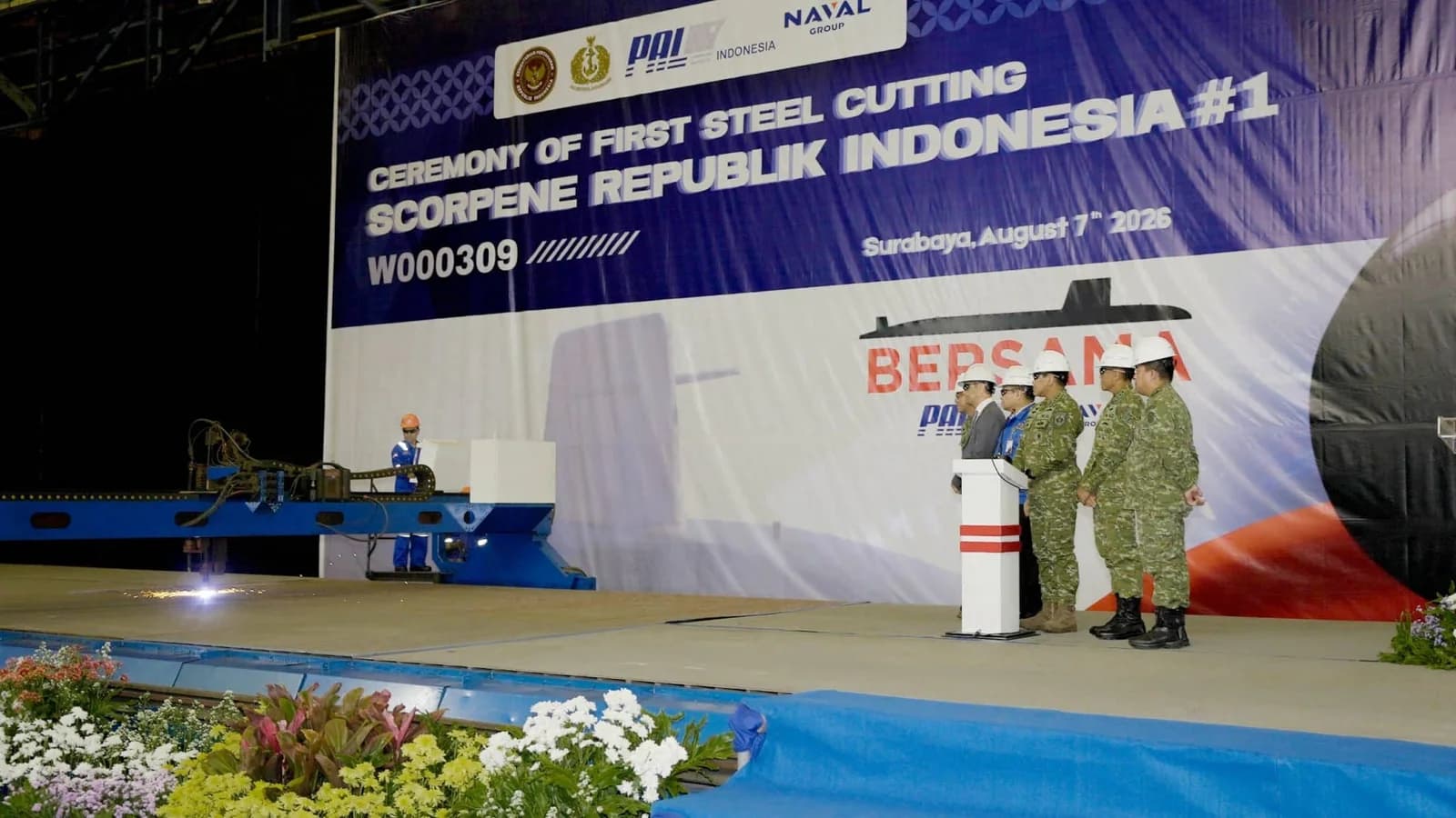 Workers and officials at PT PAL's first steel-cutting ceremony for Indonesia's first Scorpene Evolved submarine