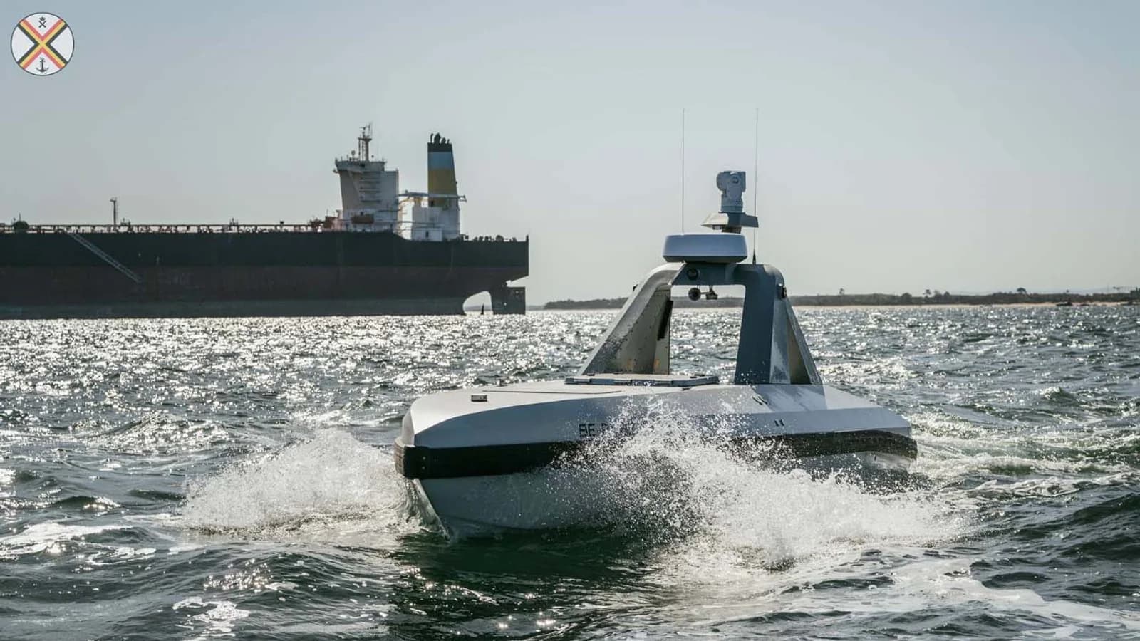 An uncrewed surface vessel moves through choppy water during REPMUS 2026 in Portugal.