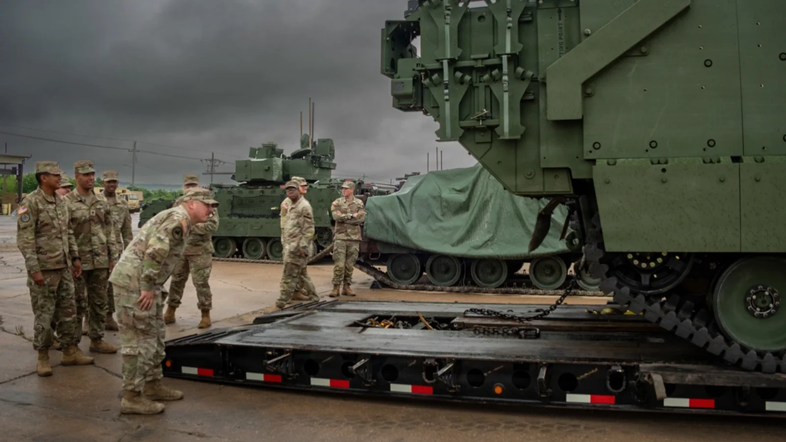 U.S. soldiers beside AMPV 30 prototypes at Fort Hood, Texas, April 30, 2026.