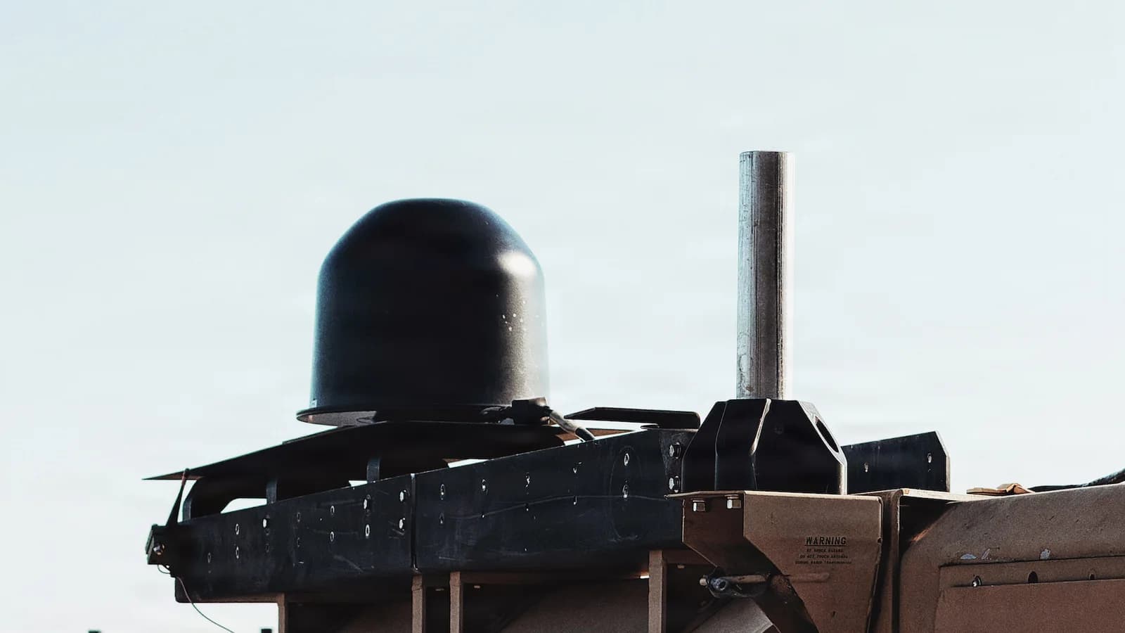 Army Spectrum Situational Awareness System equipment mounted on a tan vehicle platform