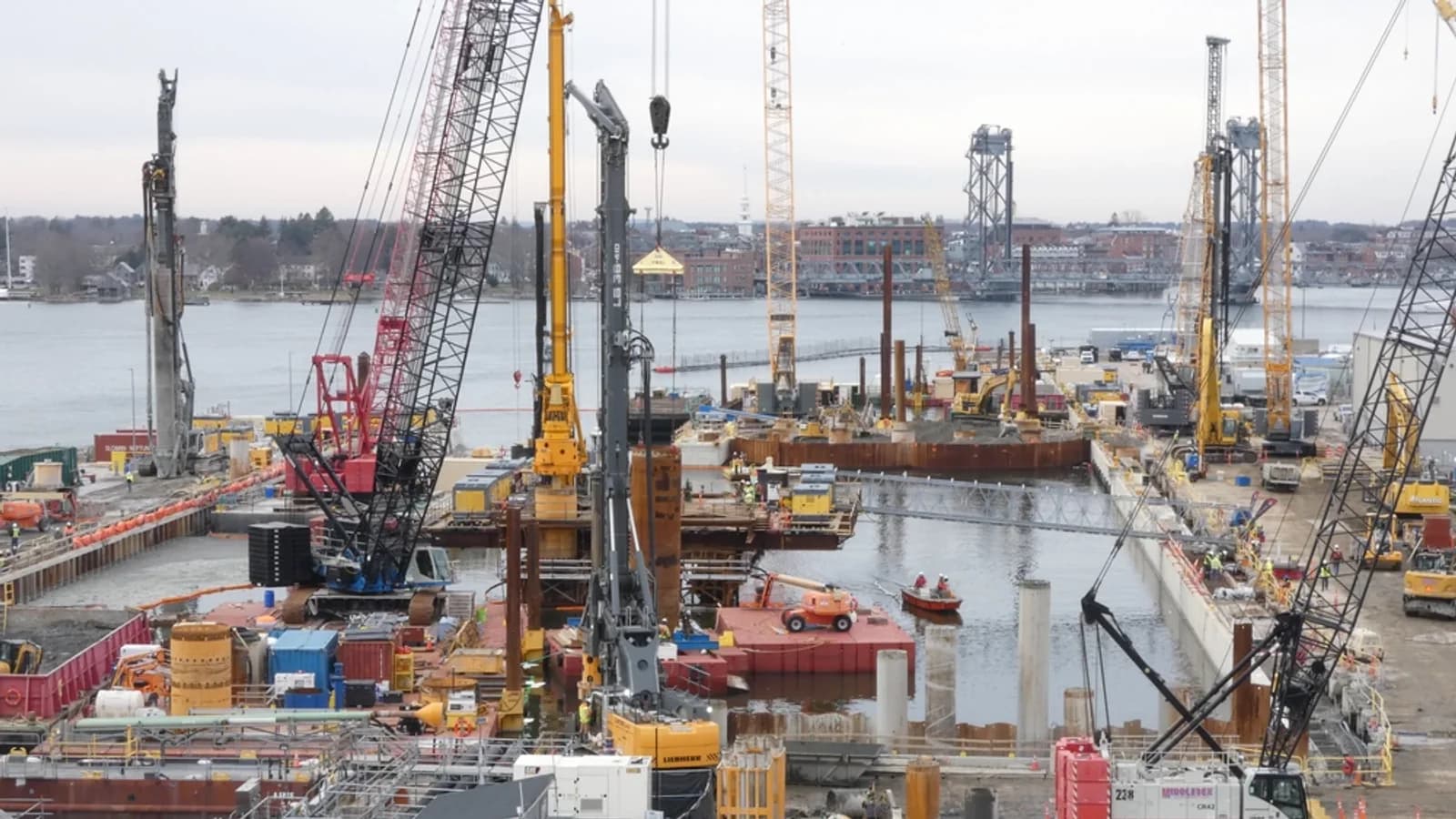 Cranes and construction equipment at Portsmouth Naval Shipyard’s Multi-Mission Dry Dock 1 in Kittery, Maine, December 2022.